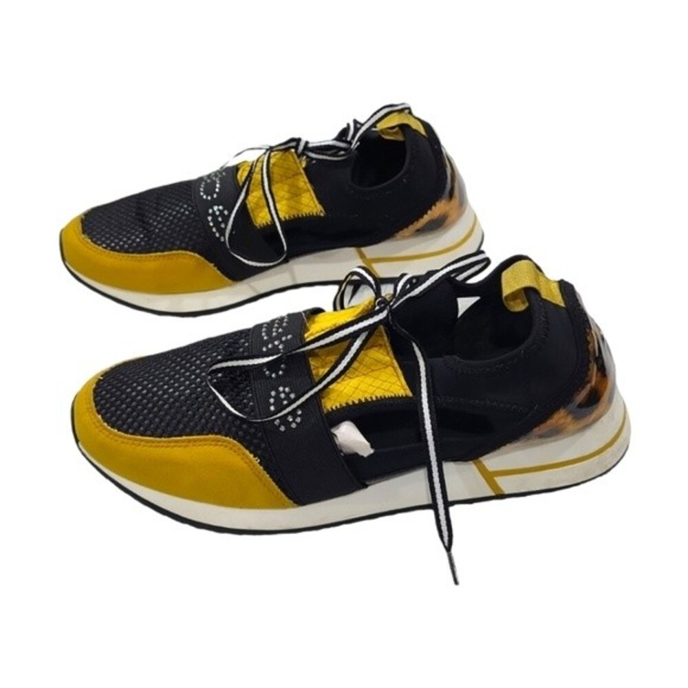 EUC Bebe women's Brienna Leopard Print Women's Sneakers 8.5, black yellow